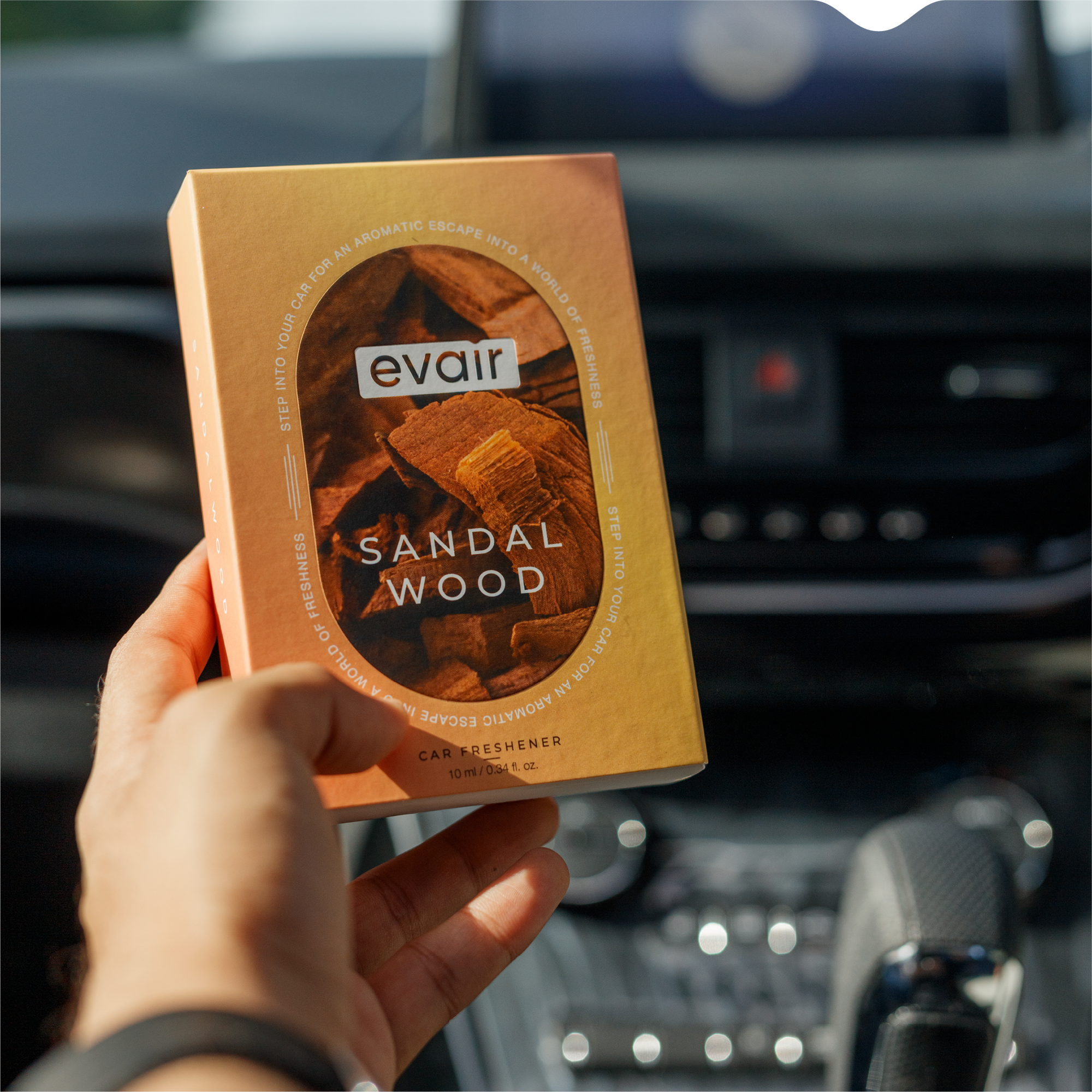 Men Holding Evair Sandalwood Long lasting Car  Perfume in car